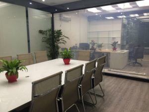 Switchable glass wall partition on