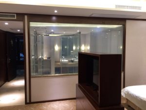 Switchable glass wall partition on